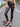 A Woman Wearing High-Waisted Gilded Camouflage Capes in Spring and Summer, Fashionable and Elegant Tight-Fitting Leggings